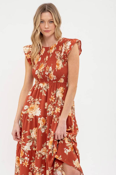 SMOCKED TIERED FLORAL MIDI DRESS: BLACK MULTI