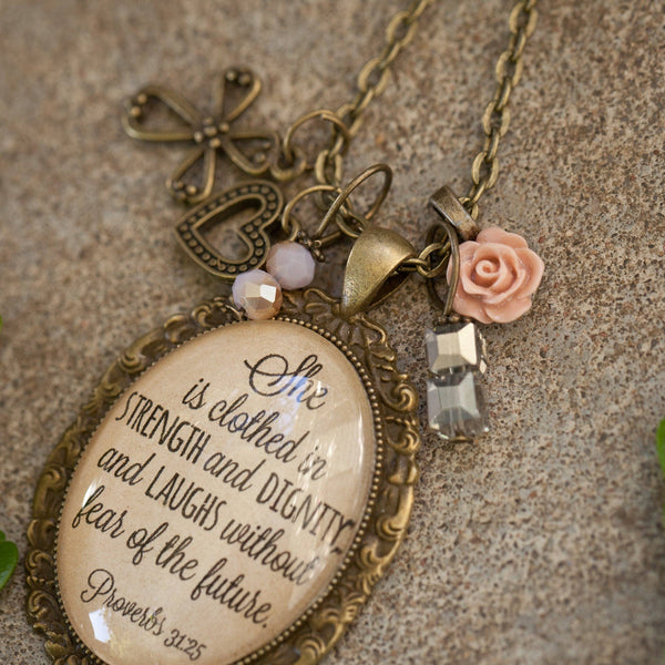 She is clothed in strength and dignity necklace