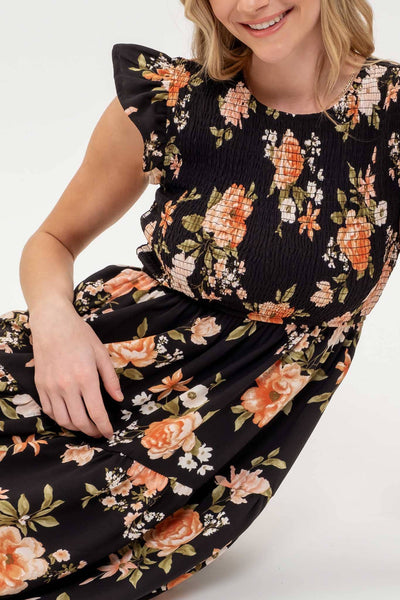 SMOCKED TIERED FLORAL MIDI DRESS: BLACK MULTI