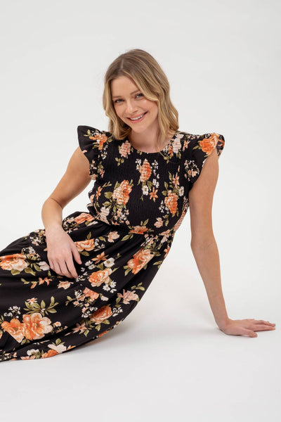 SMOCKED TIERED FLORAL MIDI DRESS: BLACK MULTI