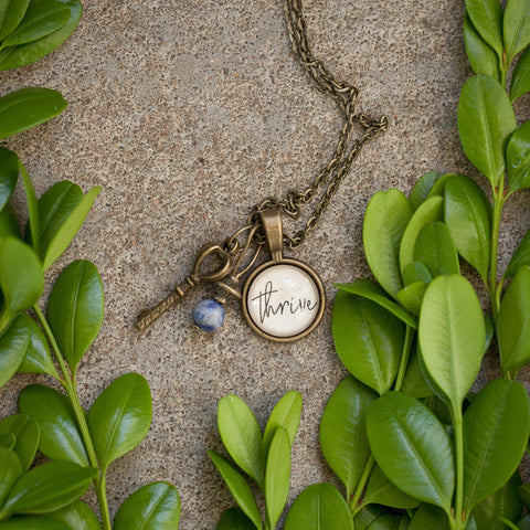 Thrive pendant necklace